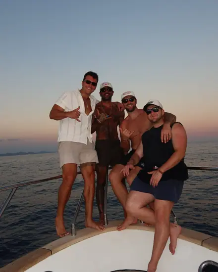 Reps on a boat at sunset